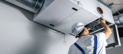 hvac seo hvac contractor working on air duct